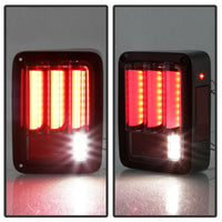 Thumbnail for Spyder 07-16 Jeep Wrangler Version 2 Light Bar LED Tail Lights - Red Clear (ALT-YD-JWA07V2-LBLED-RC)