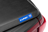 Thumbnail for Lund 05-10 Dodge Dakota Fleetside (5.3ft. Bed) Hard Fold Tonneau Cover - Black